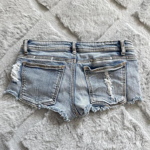 Distressed denim micro shorts with studded details - Picture 2 of 4